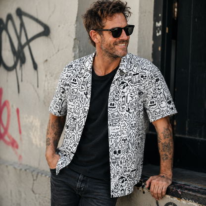 Hard lines soft morals Collage Overshirt worn open over a plain tee. 